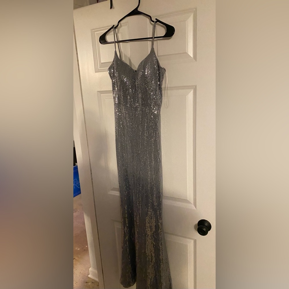 Beautiful sequin holographic long prom dress. Windsor
